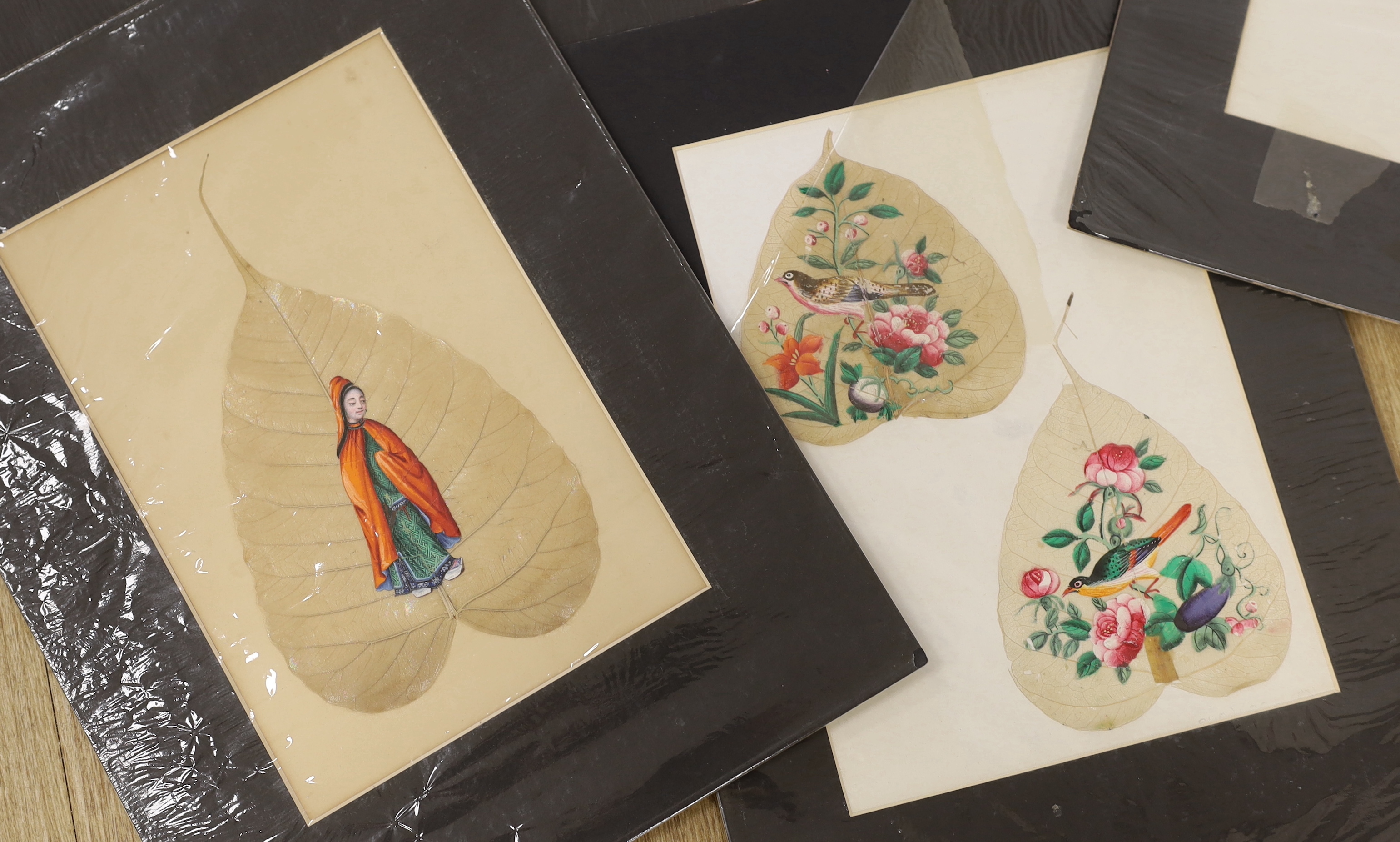 19th century Chinese School, twenty gouaches on mulberry leaves, Studies of figures, birds and flowers, largest 24 x 14cm, unframed